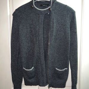 100% cashmere with zip front.